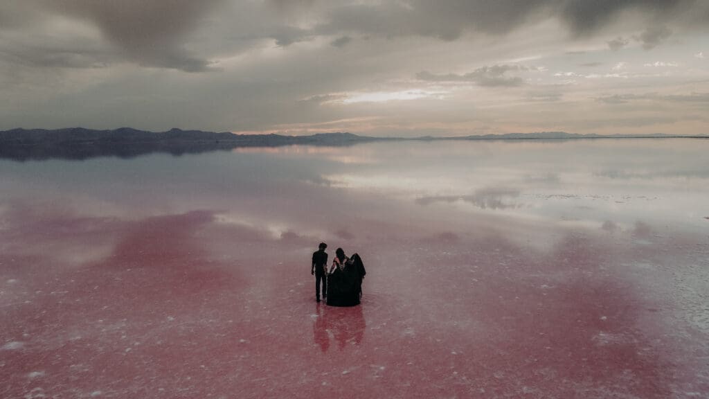 Pink Lake elopement couple in Stansbury Island Utah for non traditional couples