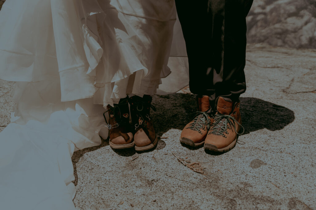 Hiking elopement couple at Glacier Point in Yosemite National Park